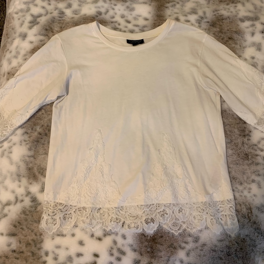 Top shop. Never worn. White with lace. Super soft and not sheer.